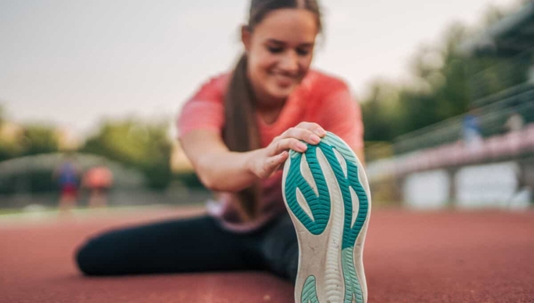 Runner stretching before a run