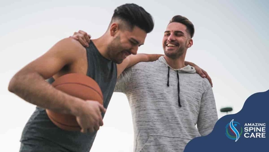 Two friends on a basketball court