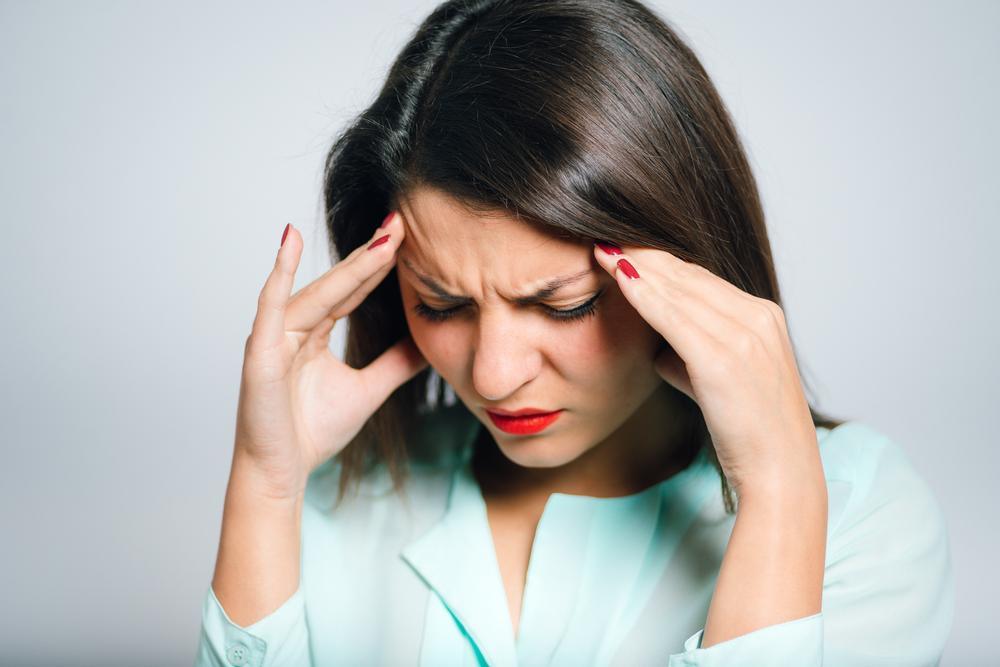 Woman with Migraine